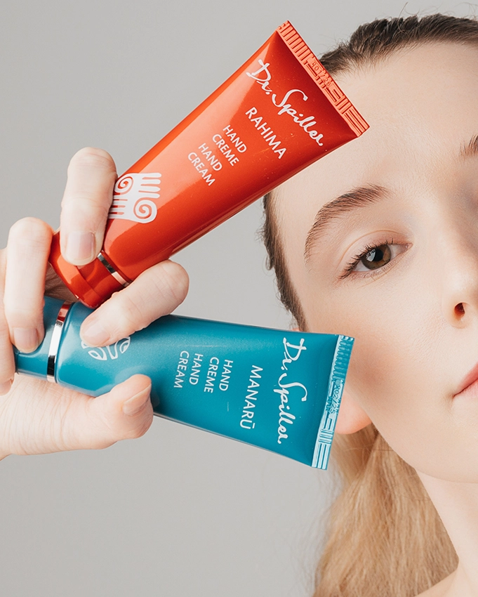 Manaru & Rahima hand cream with laughing woman