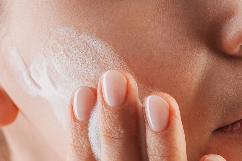 Application of the Trawenmoor facial cleanser on the cheek