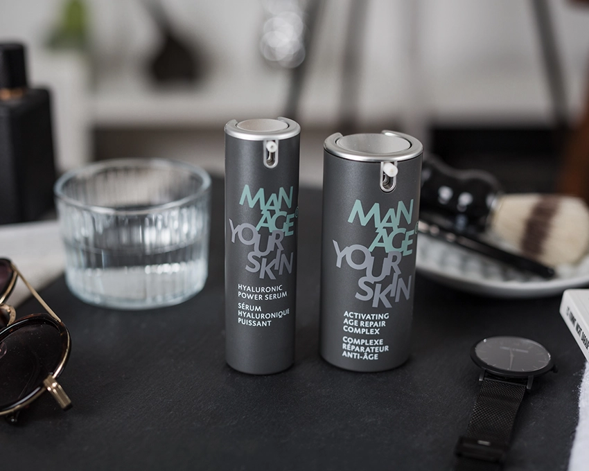 Men's facial serum & cream stylishly placed on the table