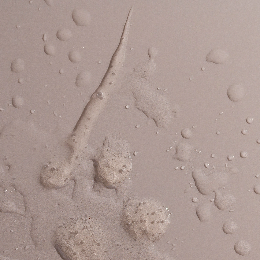 Close-up texture - Energizing Body & Hair Shampoo liquid, transparent texture