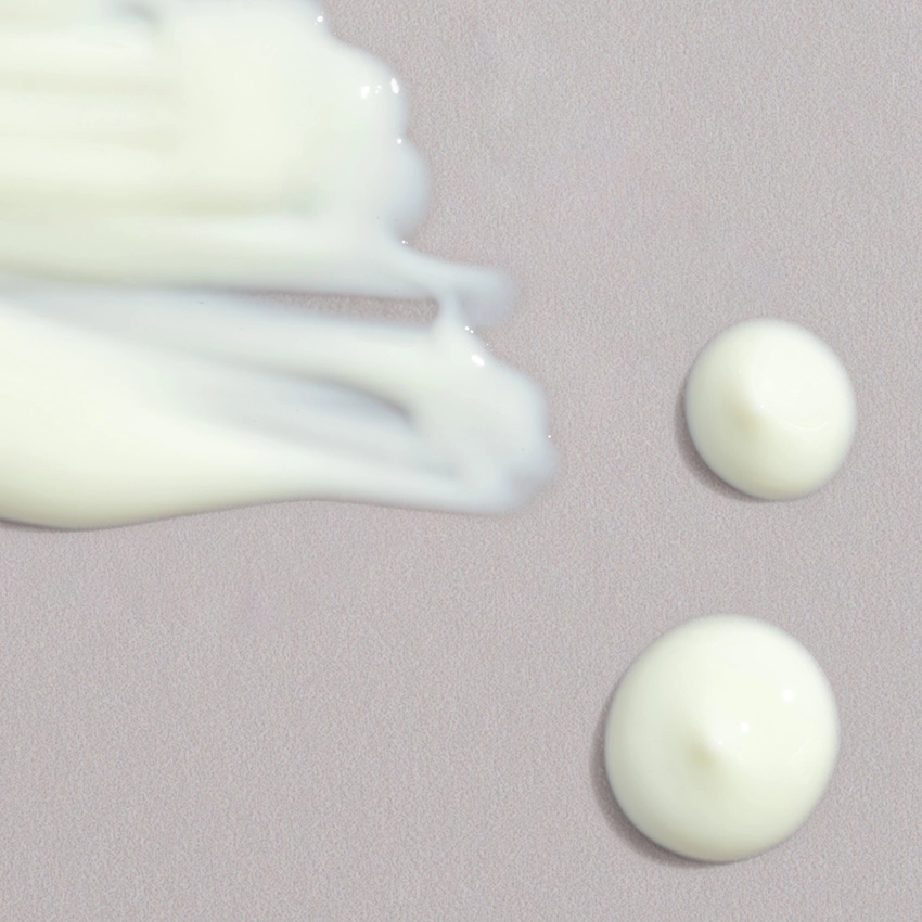 Close-up texture - white-yellowish, milky cleaning