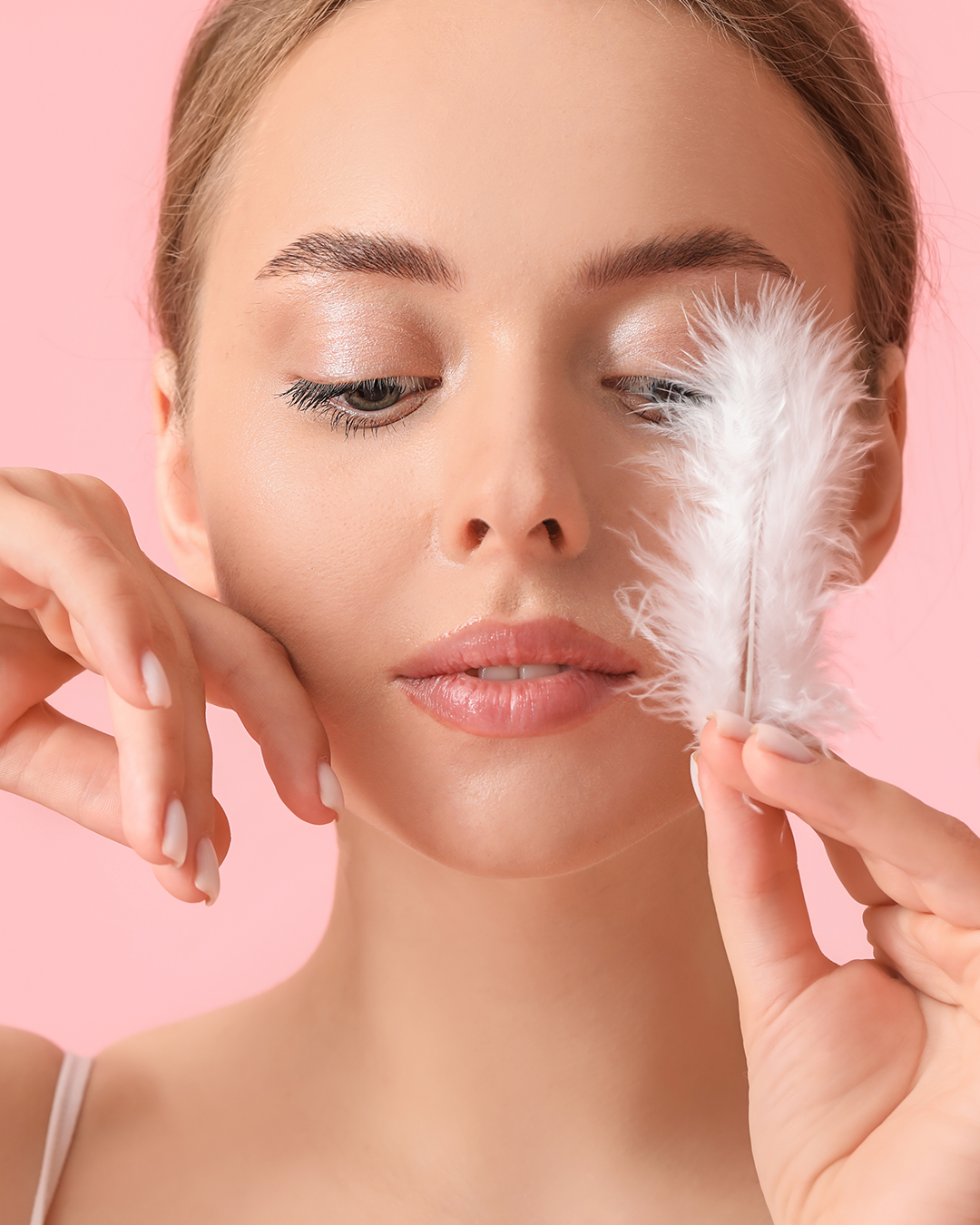 Woman with a feather in her hand