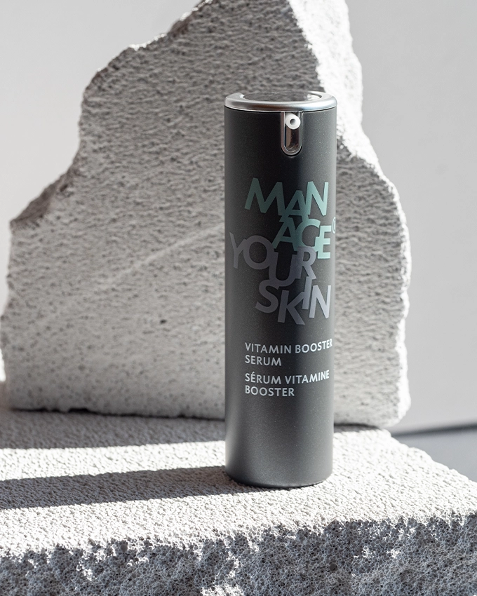 Vitamin Booster Serum pump dispenser elegantly staged