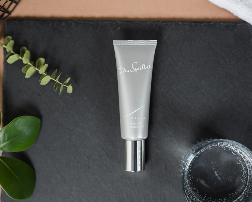 Overnight Repair Mask Tube on a dark, stylish surface