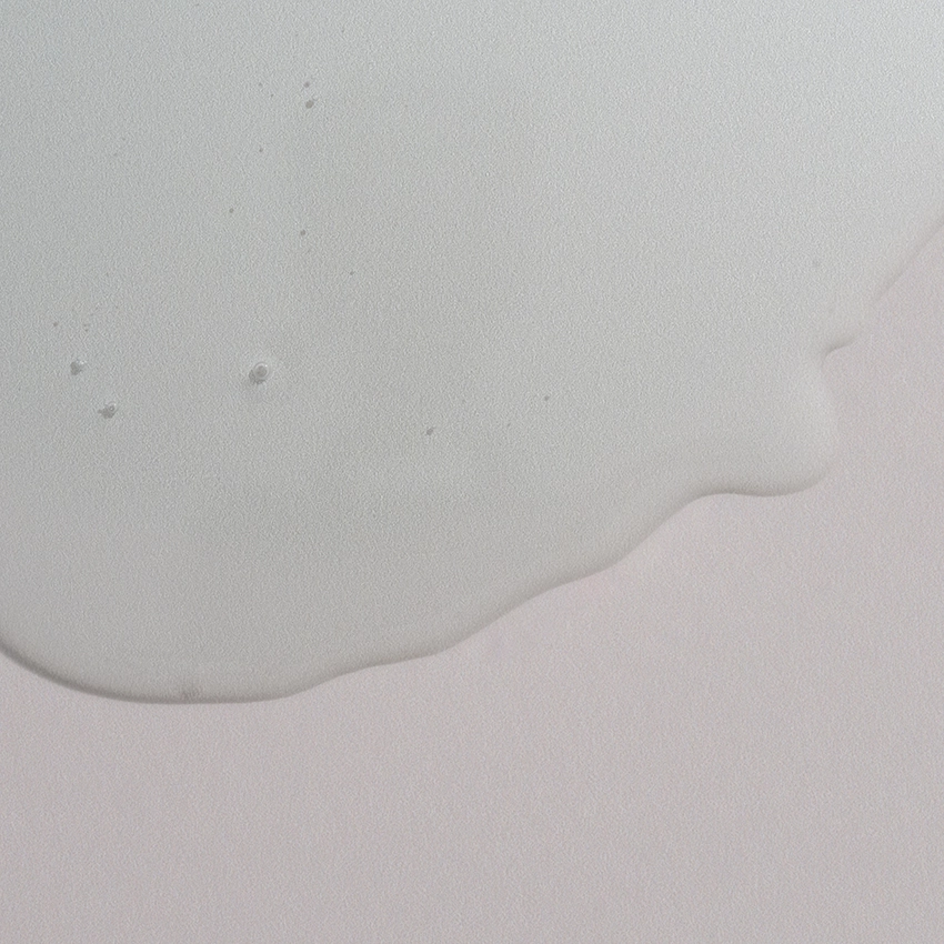 Close-up texture - slightly bluish, transparent tonic