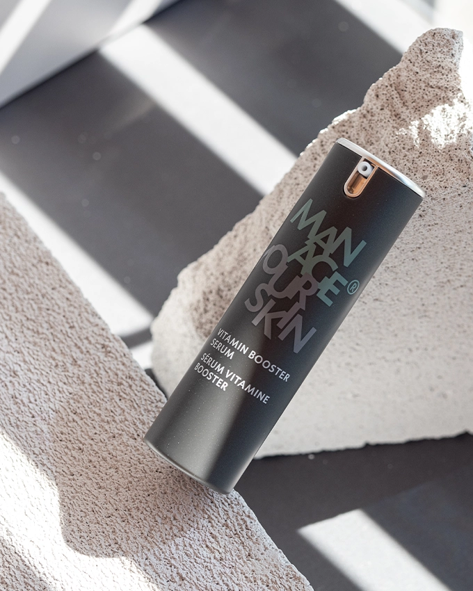 Vitamin Booster Serum pump dispenser creatively staged