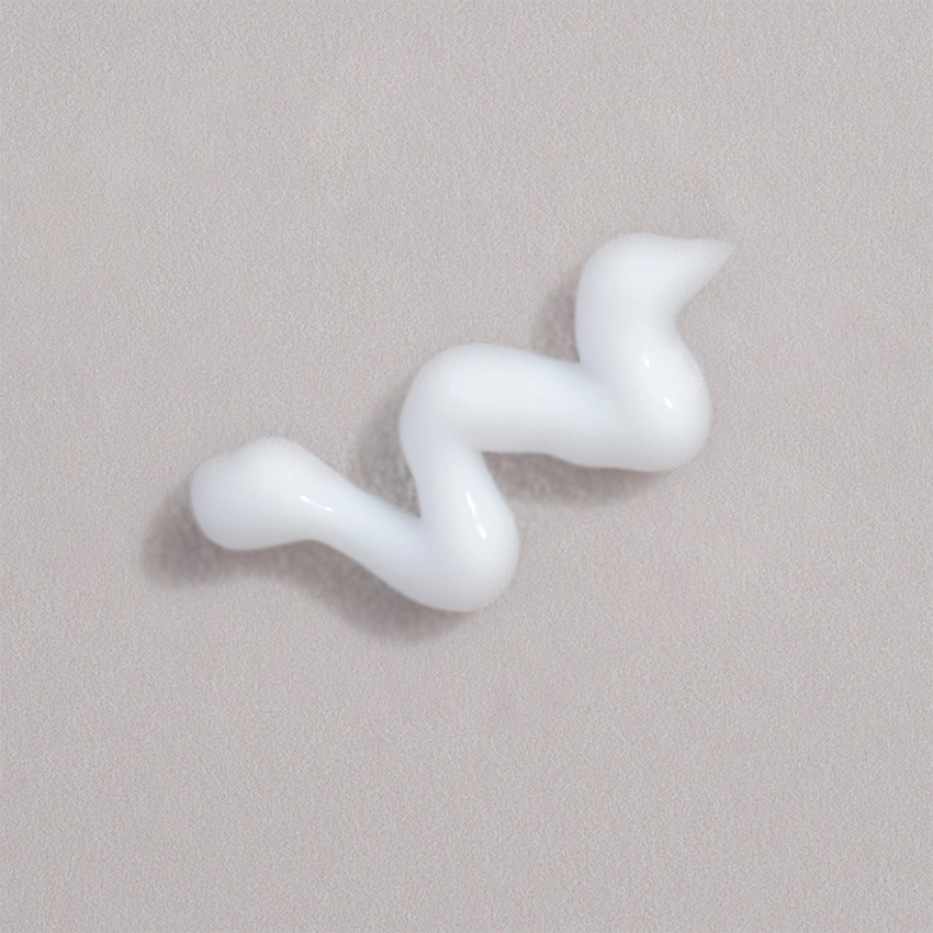 Nahaufnahme Textur - weißlich-milchigen Augencreme