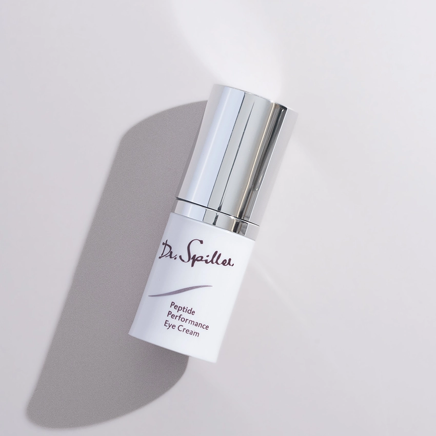 Peptide Performance Eye & Lip Cream is on the table